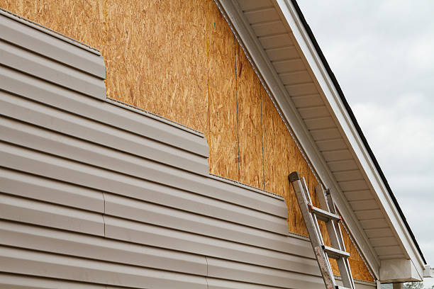 Professional Siding Contractor technician working in Mill Creek, PA
